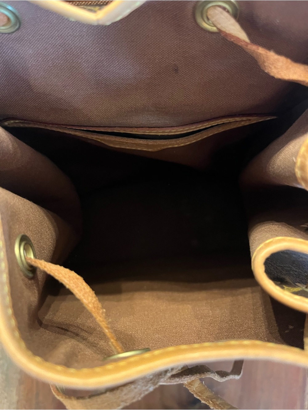 Louis Vuitton Monogram Backpack in Brown and Tan Leather Trim - Picture 11 of 12